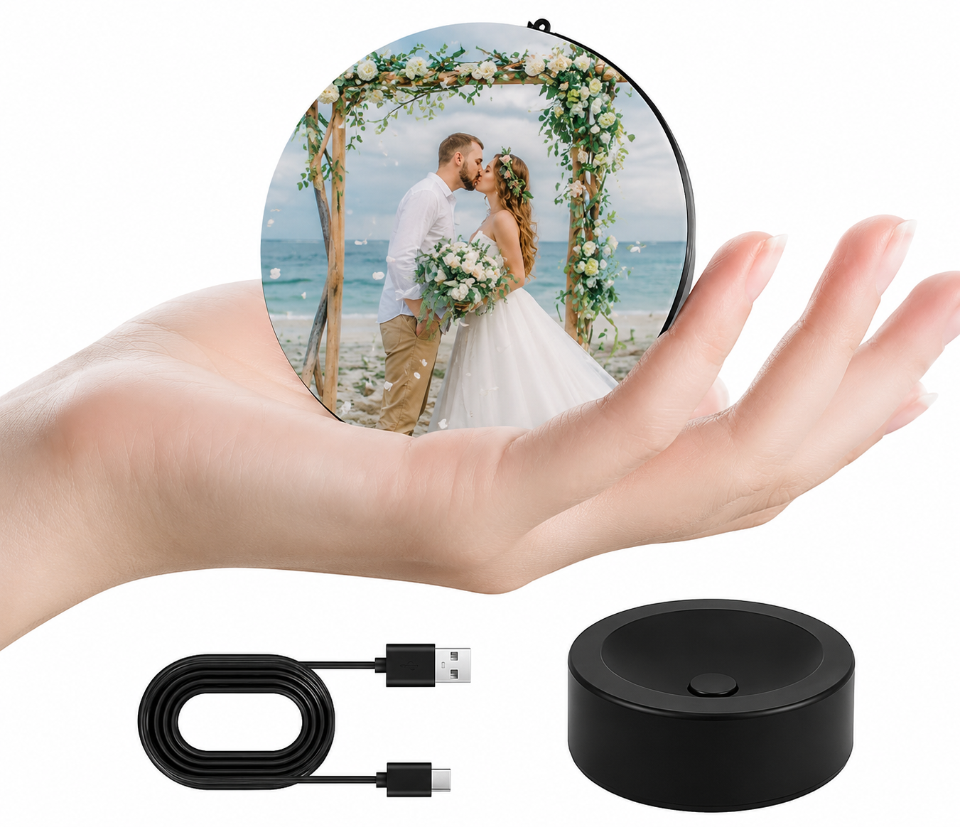 Velora Sphere displaying a personalized wedding photo, shown with charging cable and base